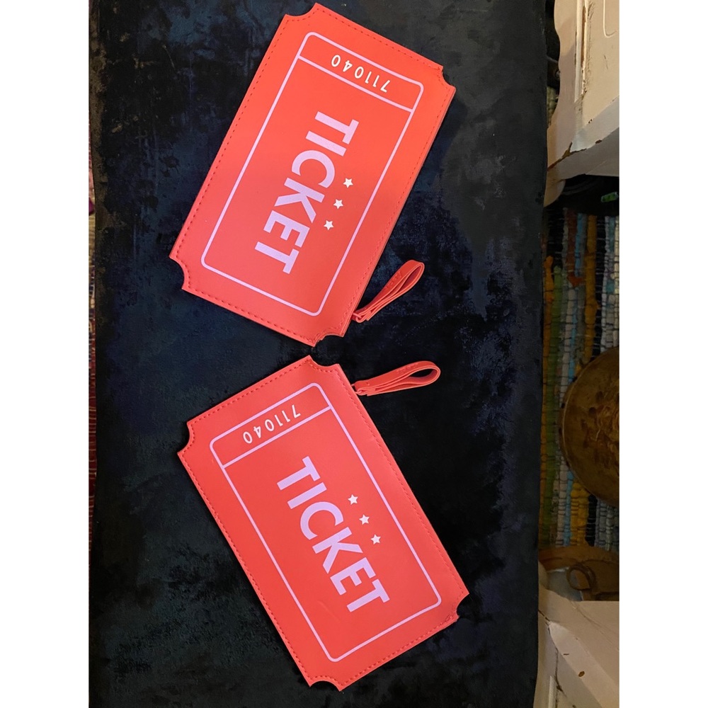 Two ticket makeup bags!